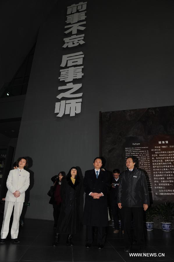Former Japanese Prime Minister Yukio Hatoyama (2nd R front) visits the Memorial Hall of the Victims in Nanjing Massacre by Japanese Invaders in Nanjing, capital of east China's Jiangsu Province, Jan. 17, 2013. (Xinhua/Han Yuqing)