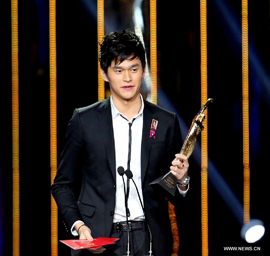 China's Olympics champion Sun Yang is awarded Best male athlete during the ceremony of 2012 CCTV Sports Personality of the year in Beijing, China, Jan. 19, 2013. (Xinhua/Li Ying)