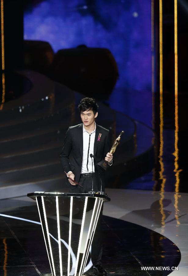 China's Olympics champion Sun Yang is awarded Best male athlete during the ceremony of 2012 CCTV Sports Personality of the year in Beijing, China, Jan. 19, 2013. (Xinhua/Bai Xuefei)