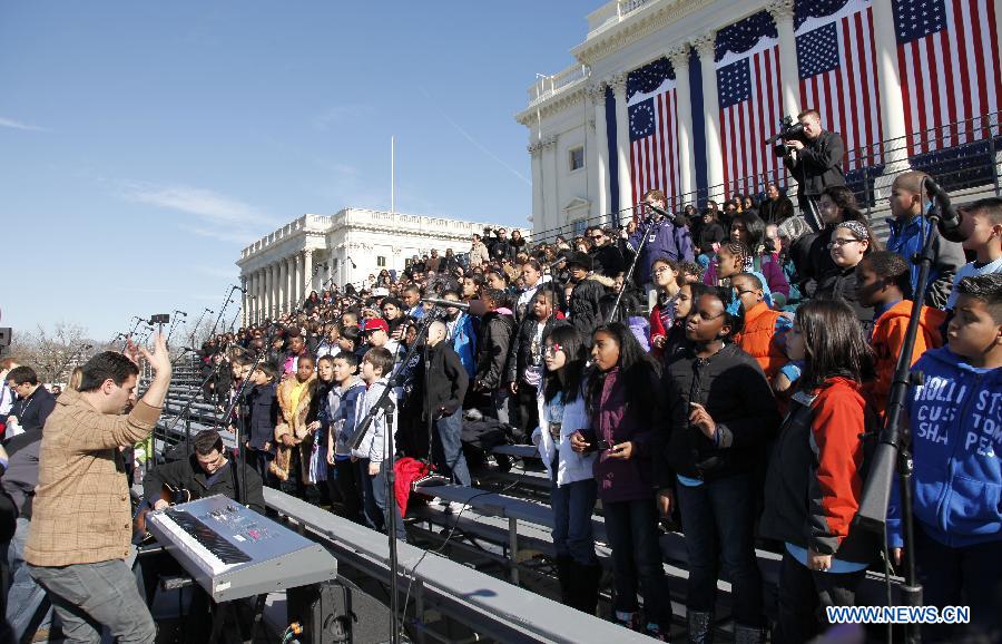 The children chorus rehearses at the U.S. Capitol during preparations for U.S. President Barack Obama's second inauguration in Washington D.C., the United States, Jan. 20, 2013. An estimated 800,000 people may attend Monday's inauguration ceremony and parade. (Xinhua/Fang Zhe) 