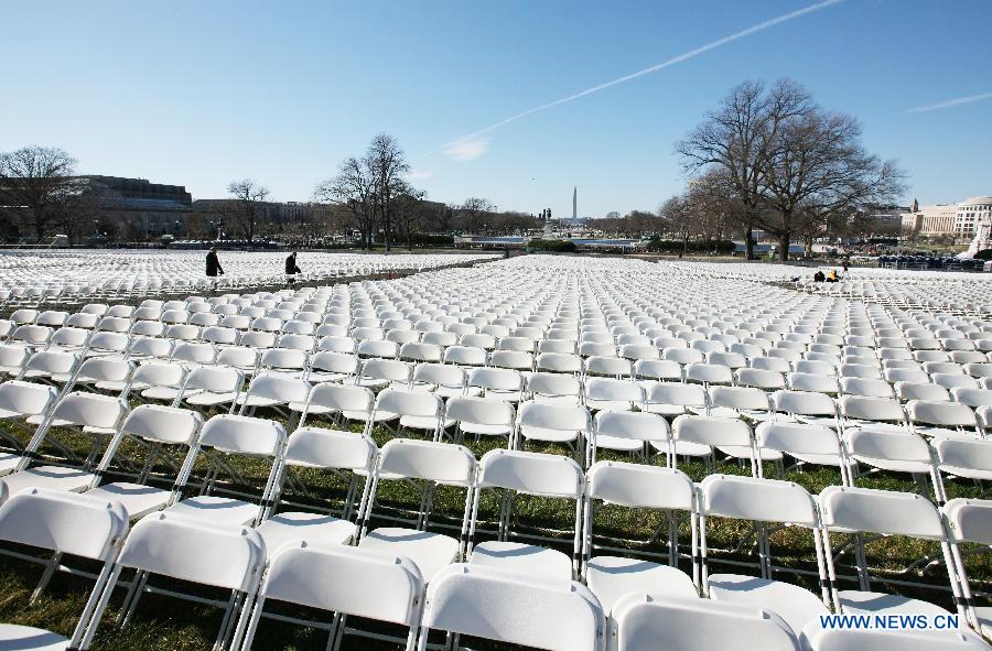 Chairs are placed on the west front of the U.S. Capitol during preparations for U.S. President Barack Obama's second inauguration in Washington D.C., the United States, Jan. 20, 2013. An estimated 800,000 people may attend Monday's inauguration ceremony and parade. (Xinhua/Fang Zhe) 