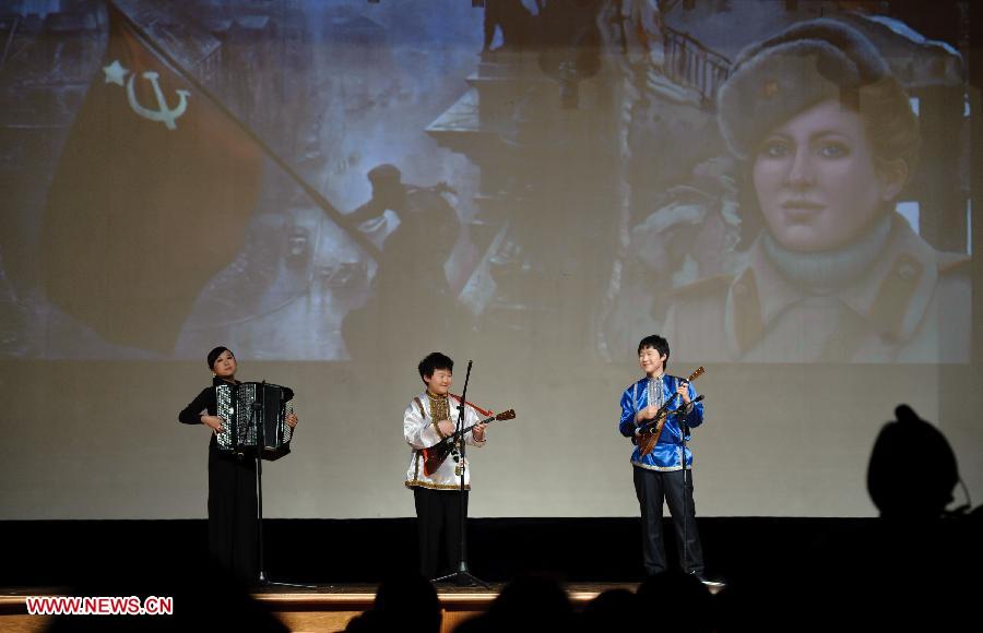 Chinese students studying in Russia play musical instruments during a performance staged at the Chinese Embassy in Moscow, Russia, Jan. 20, 2013. The performance was held here on Sunday in celebration of China's traditional Spring Festival and the upcoming Year of the Snake. (Xinhua/Jiang Kehong) 