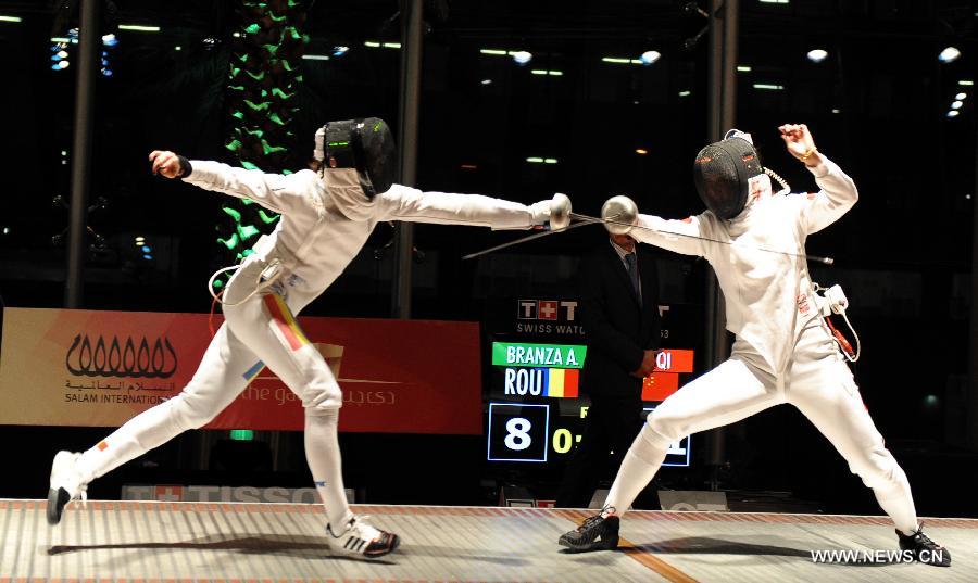 Ana Maria Branza (L) of Romania competes during the women's epee final against Xu Anqi of China at the Grand Prix of Qatar in Doha, Jan. 20, 2013. Xu Anqi won 15-11 and claimed the title. (Xinhua/Chen Shaojin) 