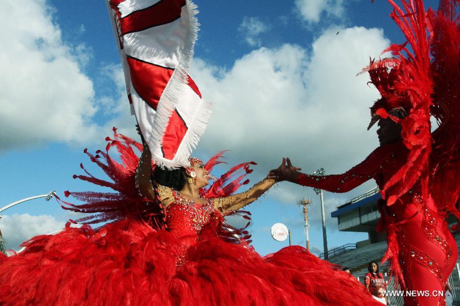 Members of samba schools participate in a rehearsal of Rio de Janeiro Carnival 2013, at the Anhembi Sambodrome, in Sao Paulo, Brazil, on Jan. 20, 2013. (Xinhua/Rahel Patrasso) 