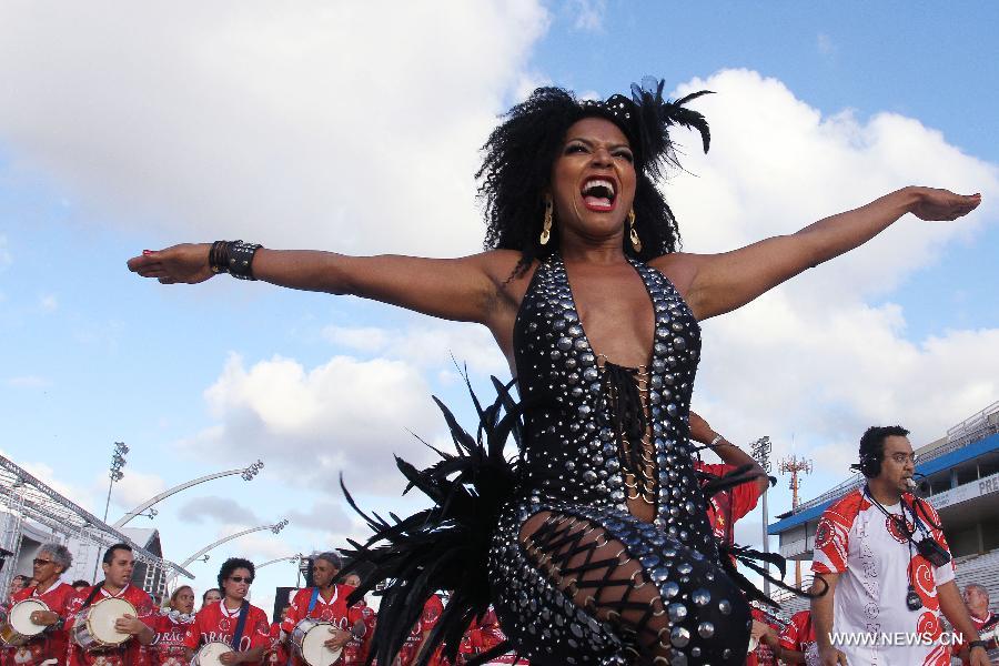 Members of samba schools participate in a rehearsal of Rio de Janeiro Carnival 2013, at the Anhembi Sambodrome, in Sao Paulo, Brazil, on Jan. 20, 2013. (Xinhua/Rahel Patrasso) 