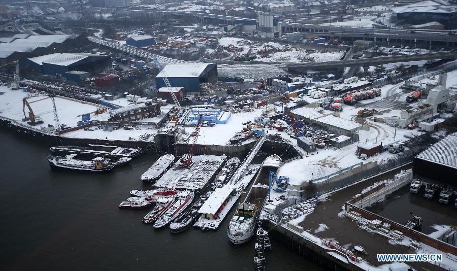 The East India Dock is seen after a snowfall in London, Britain, Jan. 18, 2013. (Xinhua/Wang Lili) 