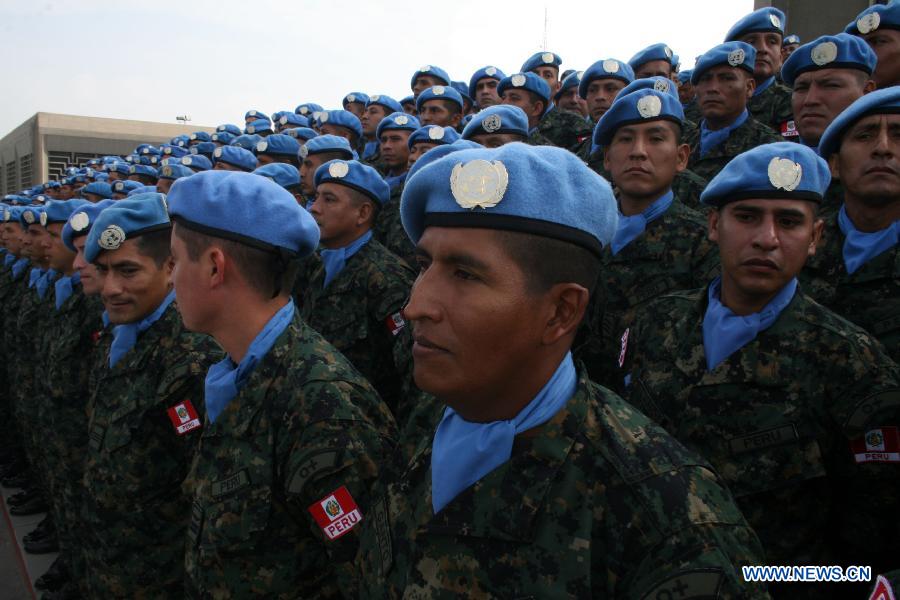 Members of the Peruvian Blue Beret attend a farewell ceremony before leaving for Haiti, in Lima, capital of Peru, on Jan. 21, 2013. During the next six months, 216 members of the Peruvian Blue Beret will participate in peacekeeping operations as part of the United Nations Stabilization Missions in Haiti (MINUSTAH). (Xinhua/Luis Camacho)