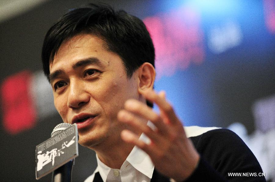 Actor Tony Leung speaks during the press conference of the film "The Grandmaster" at Marina Bay Sands' ArtScience Museum in Singapore, Jan. 23, 2013. (Xinhua/Then Chih Wey)