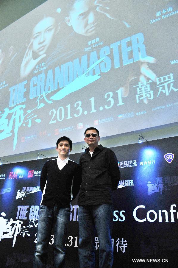 Film director Wang Kar-wai speaks during the press conference of the film "The Grandmaster" at Marina Bay Sands' ArtScience Museum in Singapore, Jan. 23, 2013. (Xinhua/Then Chih Wey)