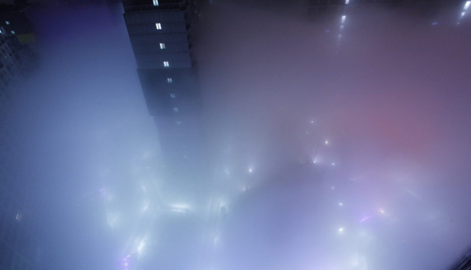 Dense fog hit back Beijing and caused serious air pollution on Tuesday and Wednesday. From the bird’s-eye view, the sleeping city was shrouded by fantasy created by shimmer of dawn, illumination and fog. (Photo/CCTV) 