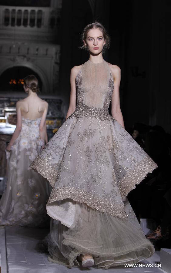 A model displays creations of Valentino during Valentino's Spring/Summer 2013 Haute Couture fashion show in Paris, France, Jan. 23, 2013. (Xinhua/Gao Jing) 