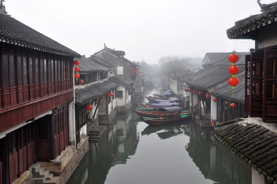 Located at the northeast of Suzhou, Jiangsu Province, the Lion Grove Garden is famous for the Taihu rocks in various shapes which are said to resemble lions, especially the large and labyrinthine grotto of rocks at the garden's center. It is recognized with other classical Suzhou gardens as a UNESCO World Heritage Site. Together with other three gardens, including Blue Wave Pavilion (Canglang Ting), Lingering Garden (Liu Yuan) and Humble Administrator's Garden (Zhuozheng Yuan), the Lion Grove Garden is one of the four most famous and representative gardens of ancient classical style in Suzhou City. (China.org.cn / Yuan Fang)