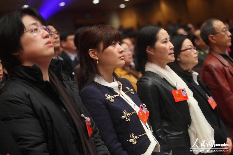 Kelly Zong is the President of Hangzhou Wahaha Group, which is the largest food & beverage enterprise in China. It is her first time to attend the CPPCC meeting as a CPPCC member at the opening ceremony of the 11th session of the Zhejiang Provincial People's Political Consultative Conference on Jan. 24, 2013.(CPC/Chen Zhongqiu)