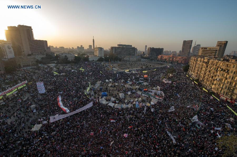 Egyptians gather at the Cairo's iconic Tahrir Square on Jan. 25, 2013, during a massive demonstrations held nationwide to mark the second anniversary of the 2011 unrest that toppled former president Hosni Mubarak. (Xinhua/Li Muzi) 