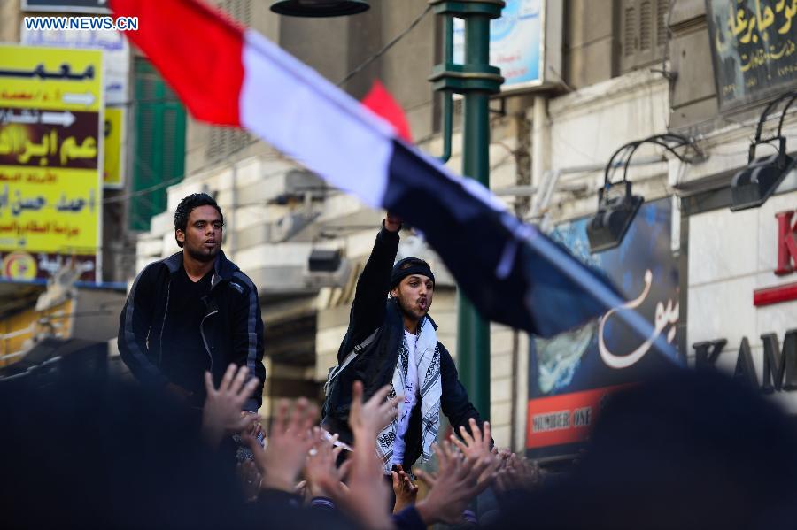 Egyptians participate in a rally in Alexandria, the second biggest city of Egypt, on Jan. 25, 2013, marking the second anniversary of the 2011 unrest that toppled former leader Hosni Mubarak. (Xinhua/Qin Haishi)