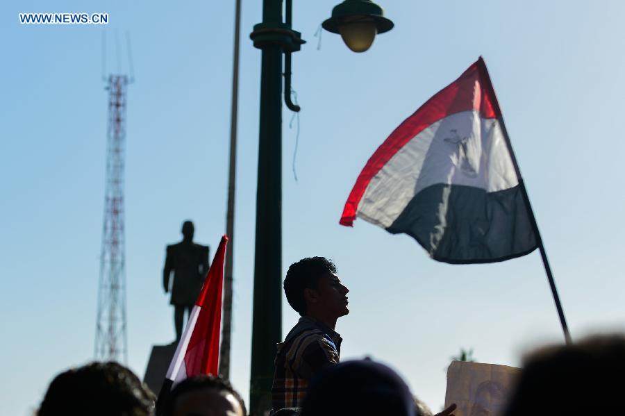 Egyptians participate in a rally in Alexandria, the second biggest city of Egypt, on Jan. 25, 2013, marking the second anniversary of the 2011 unrest that toppled former leader Hosni Mubarak. (Xinhua/Qin Haishi) 