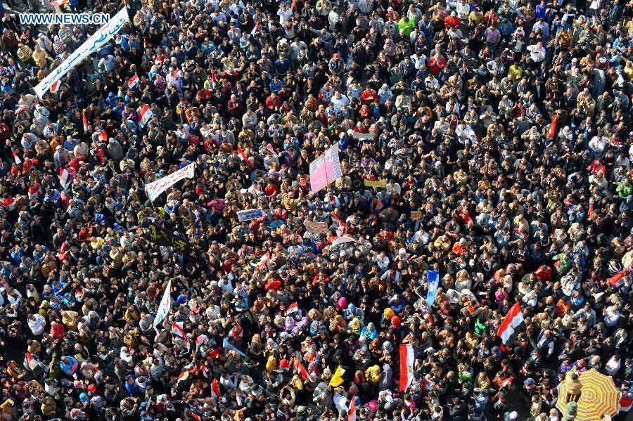Egyptians gather at the Cairo's iconic Tahrir Square on Jan. 25, 2013, during a massive demonstrations held nationwide to mark the second anniversary of the 2011 unrest that toppled former president Hosni Mubarak. (Xinhua/Li Muzi) 
