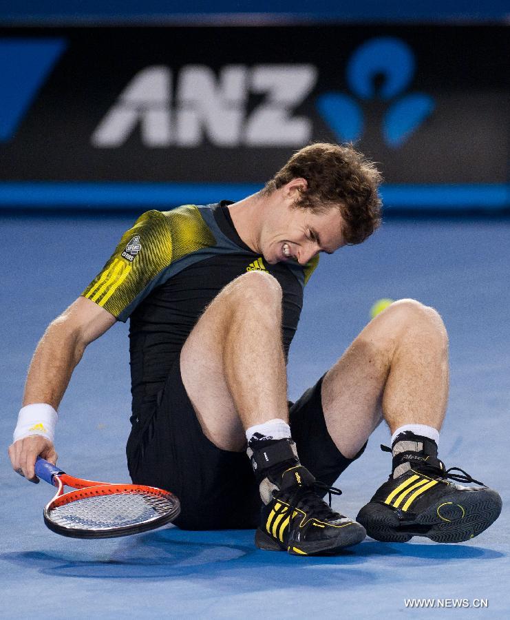 Andy Murray of Britain reacts during the men's singles semifinal match against Roger Federer of Switzerland at the 2013 Australian Open tennis tournament in Melbourne, Australia, Jan. 25, 2013. Murray won 3-2 to enter the final. (Xinhua/Bai Xue) 