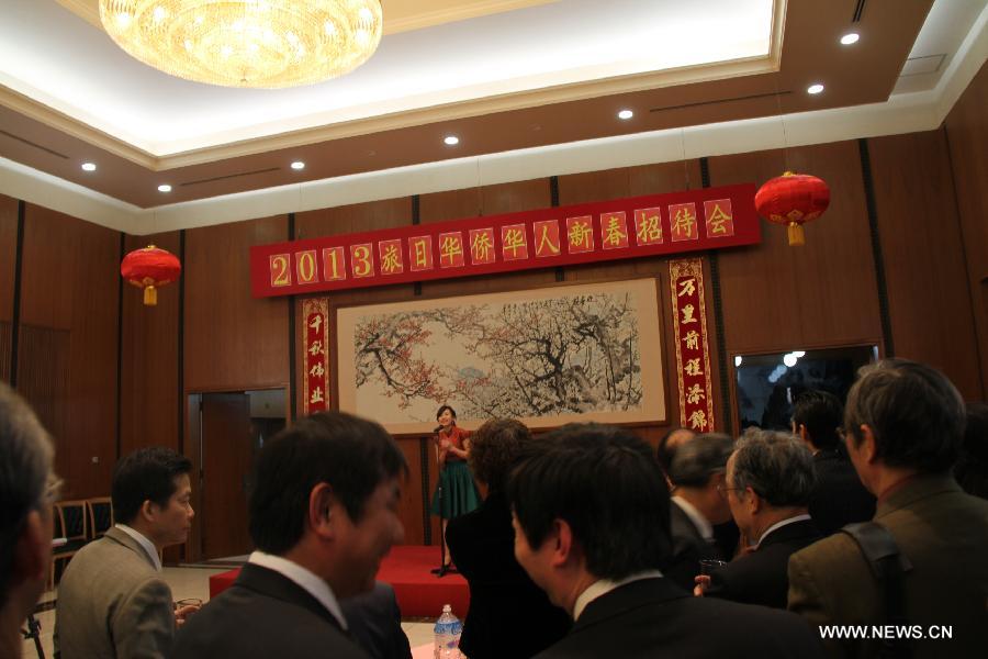 A reception for overseas Chinese is held at Chinese Embassy in Tokyo, capital of Japan, on Jan. 25, 2013. The Chinese Embassy in Tokyo held the reception for overseas Chinese on Friday to greet the upcoming Chinese traditional Spring Festival. (Xinhua) 