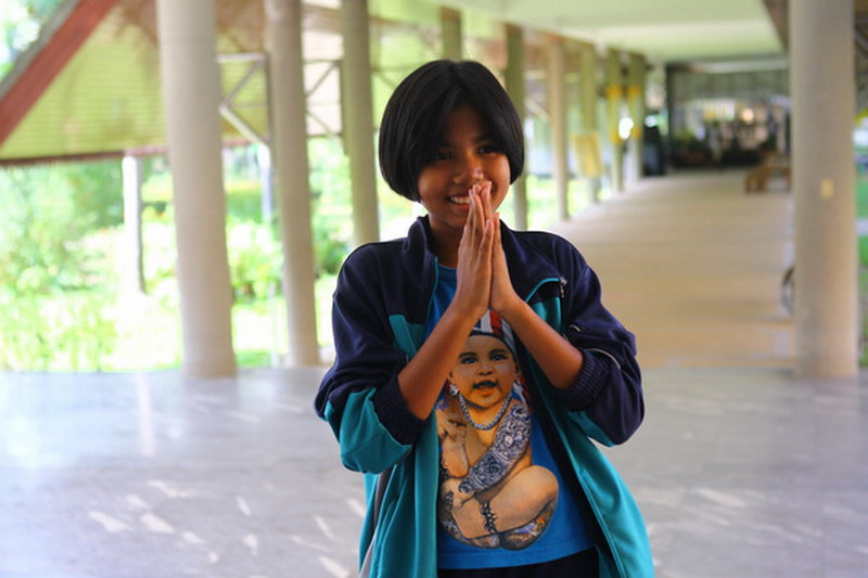 Chaniga Taumjun, 12, takes a break at a botanic garden in Ayutthaya, the former capital of Thailand.