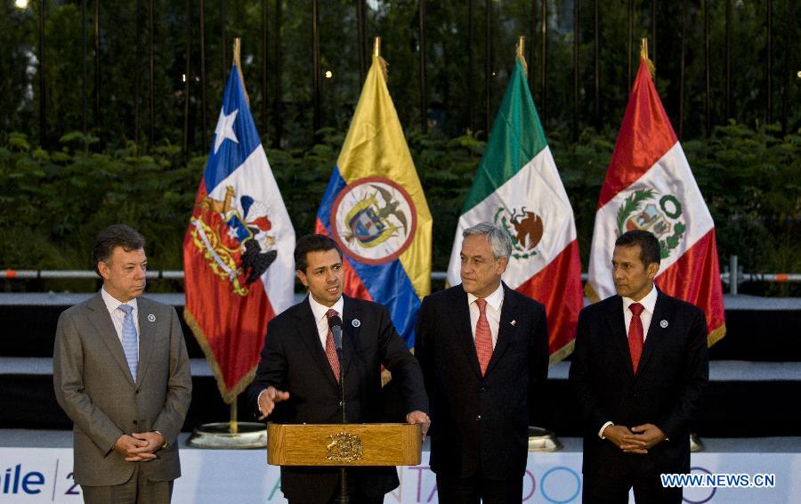 Colombia's President Juan Manuel Santos, Mexican President Enrique Pena Nieto, Chile's President Sebastian Pinera and Peruvian President Ollanta Humala (From L to R) attend a news conference after their meeting during the Community of Latin American and Caribbean States (CELAC) Summit breaks in Santiago, capital of Chile, on Jan. 27, 2013. (Xinhua/Zhang Jiayang) 