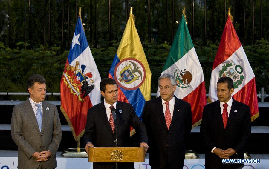 Colombia's President Juan Manuel Santos, Mexican President Enrique Pena Nieto, Chile's President Sebastian Pinera and Peruvian President Ollanta Humala (From L to R) attend a news conference after their meeting during the Community of Latin American and Caribbean States (CELAC) Summit breaks in Santiago, capital of Chile, on Jan. 27, 2013. (Xinhua/Zhang Jiayang) 