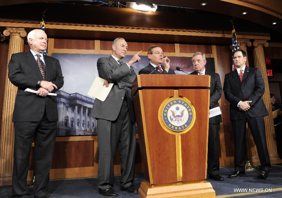 (L to R) U.S. Senators John McCain (R-AZ), Charles Schumer (D-NY), Robert Menendez (D-NJ), Richard Durbin (D-IL) and Marco Rubio (R-FL) attend a press conference on bipartisan framework for comprehensive immigration reform on Capitol Hill, in Washington D.C., capital of the United States, Jan. 28, 2013. (Xinhua/Zhang Jun) 