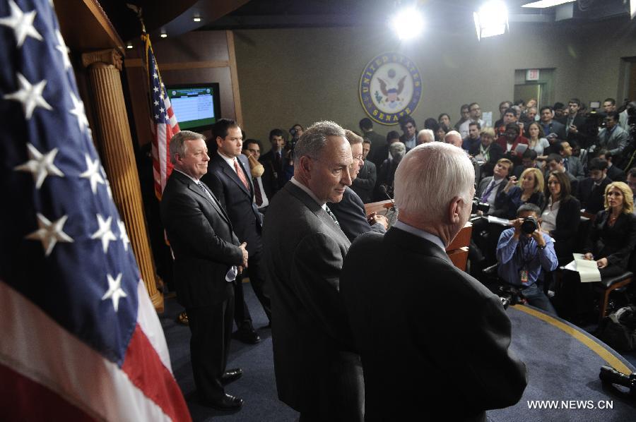 (R to L) U.S. Senators John McCain (R-AZ), Robert Menendez (D-NJ), Charles Schumer (D-NY), Richard Durbin (D-IL) and Marco Rubio (R-FL) attend a press conference on bipartisan framework for comprehensive immigration reform on Capitol Hill, in Washington D.C., capital of the United States, Jan. 28, 2013. (Xinhua/Zhang Jun) 