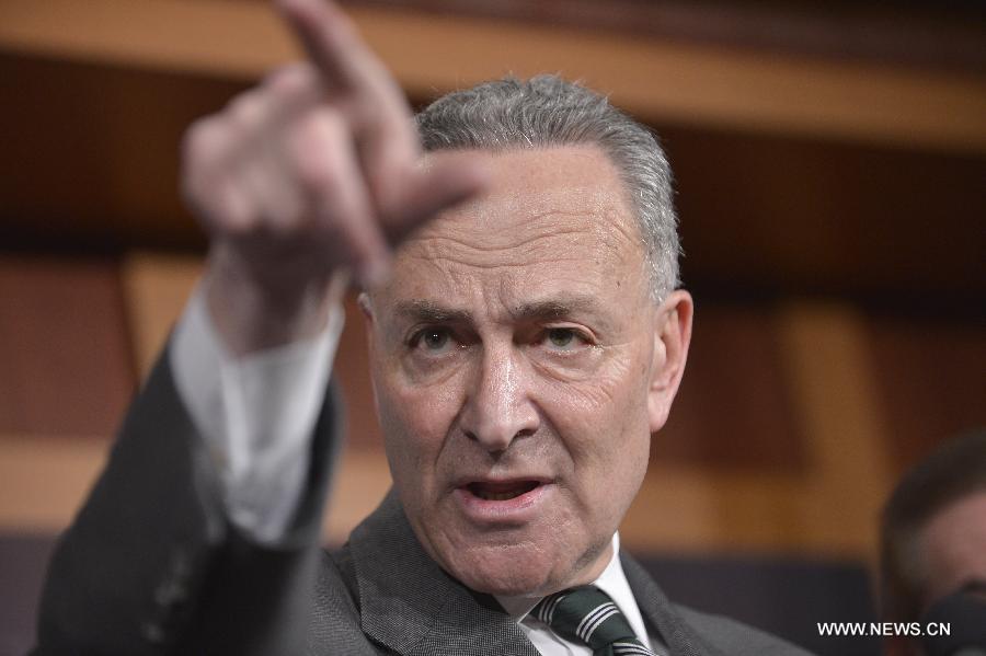 U.S. Senator Charles Schumer (D-NY) speaks during a press conference on bipartisan framework for comprehensive immigration reform on Capitol Hill, in Washington D.C., capital of the United States, Jan. 28, 2013. (Xinhua/Zhang Jun)