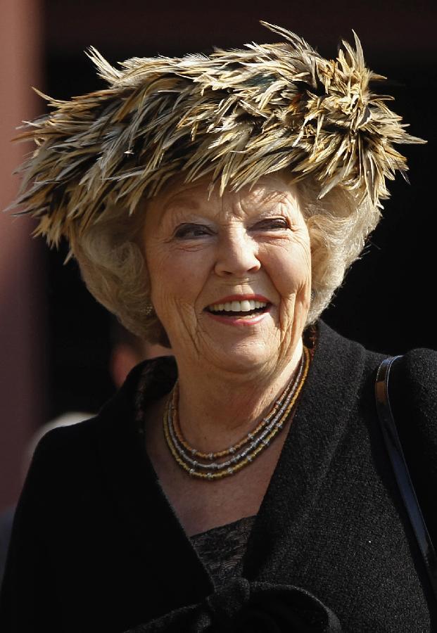 Netherlands' Queen Beatrix is seen smiling during a welcome ceremony at 'Zeche Zollverein', former coal mine in Essen in this April 15, 2011 file photo.(Xinhua/Reuters)