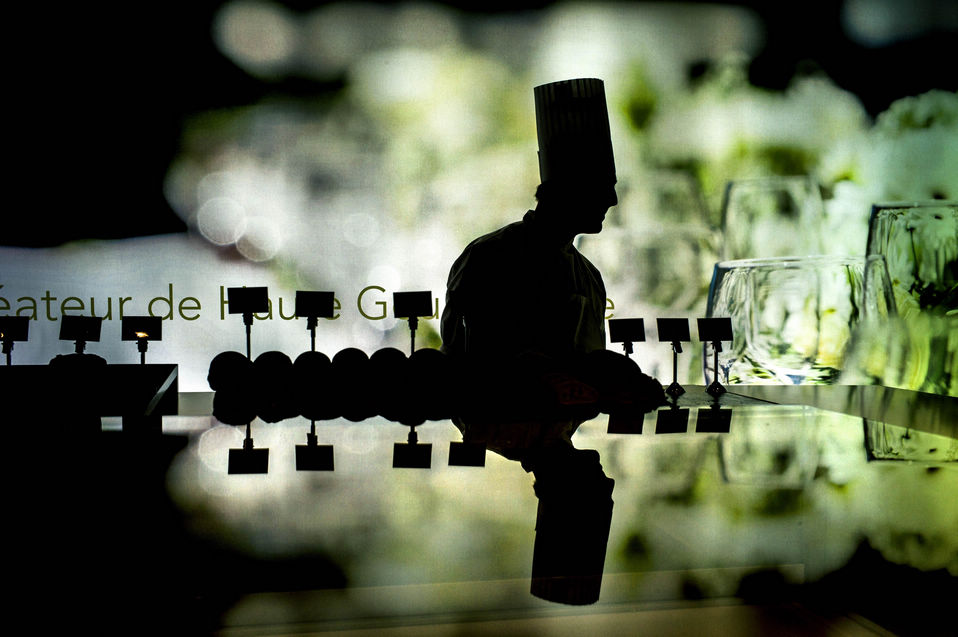 A chef works on a stand on Jan. 26, 2013 in Lyon, eastern France, on the opening day of the 2013 Sirha (the world hospitality and food service event) scheduled from Jan. 26 to 30. (Xinhua/AFP)