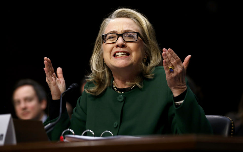 U.S. Secretary of State Hillary Clinton testifies about the September attacks on the U.S. diplomatic mission in Benghazi, Libya, on Capitol Hill, U.S., Jan. 23, 2013. It was the last time Clinton attended the Congressional hearing as the U.S. top diplomat. After the heated inquires from the House of Representatives and the Senate, the "Iron lady" rarely let herself cry, smile and be angered, which has shown different sides of her nature.(Xinhua/AFP)