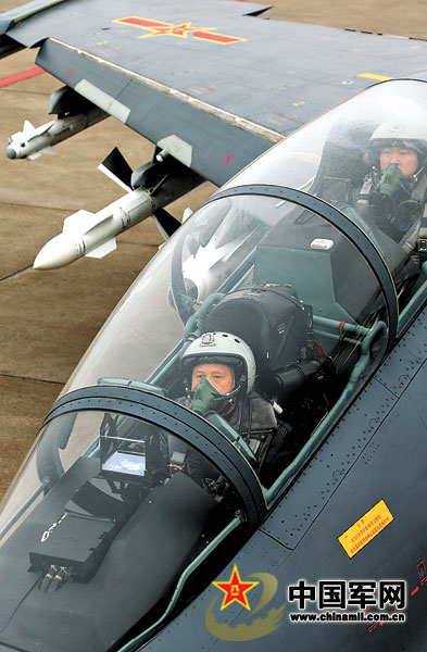 The fighters of an aviation division of the air force under the Nanjing Military Area Command (MAC) of the Chinese People's Liberation Army (PLA) took off emergently to carry out combat-readiness patrolling task on January 19, 2013. The photo shows that Jing Jianfeng, commander of the division, is ready for taking-off. (chinamil.com.cn/Lu Hui, Ben Daochun and Qian Tianfu)
