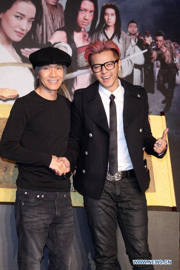 Director Stephen Chow (L) and actor Show Lo pose for photo during a press conference of the movie "Journey to the West: Conquering the Demons" in Taipei, southeast China's Taiwan, Jan. 28, 2013. The movie is expected to hit the screen on Feb. 7, 2013 in Taipei. (Xinhua) 