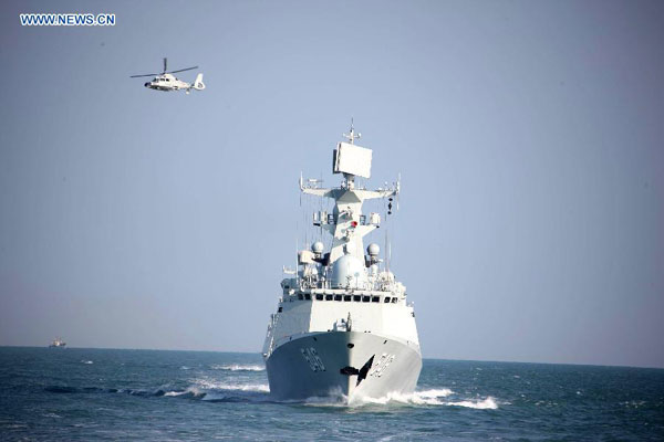 A Chinese People's Liberation Army (PLA) Navy fleet has set off from a military port in east China's Qingdao City for regular open-sea training in the West Pacific Ocean, military sources revealed Wednesday.(Xinhua/Li Yun)