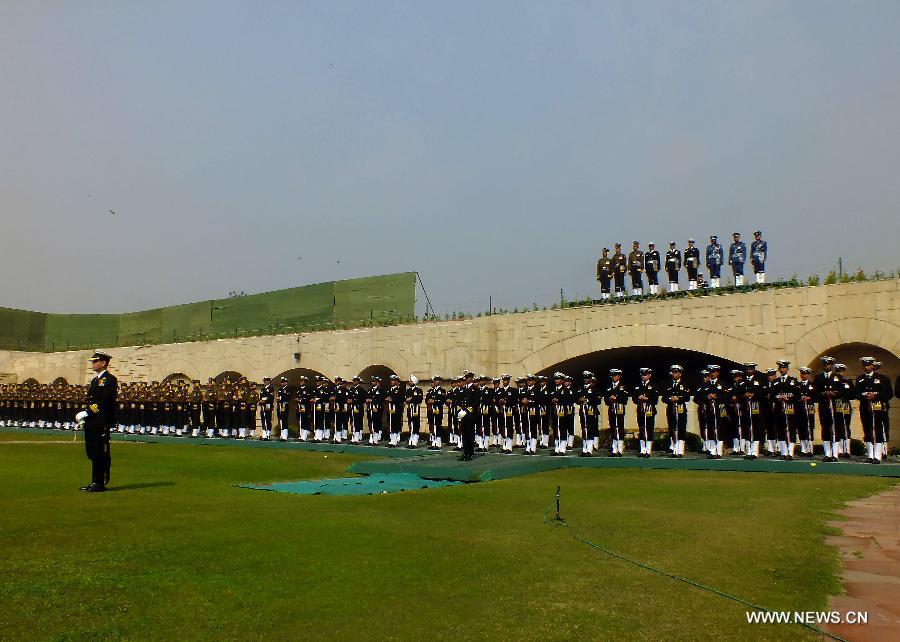 Members of the Indian army, navy and the air force participate in a Martyr's Day ceremony at the memorial of Mahatma Gandhi on his death anniversary in New Delhi, India, Jan. 30, 2013. India Wednesday paid homage to Mahatma Gandhi, who led the country to independence from Britain in 1947, on his 65th death anniversary. (Xinhua/Partha Sarkar) 
