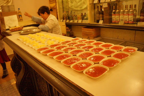 Plates of butter and jam sit on a food counter in a Russian-style restaurant in Harbin, northeast China's Heilongjiang Province, on December 17, 2012. [Photo: CRIENGLISH.com] 