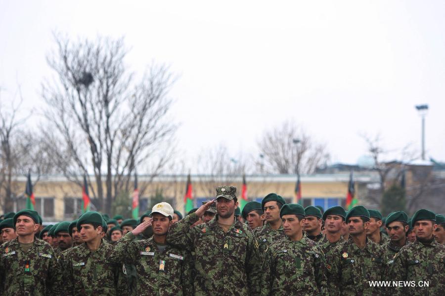 Newly graduated soldiers attend their graduation ceremony at the Kabul Military Training Center in Kabul, Afghanistan, on Jan. 31, 2013. A total of 1,400 soldiers graduated from Kabul Military Training Center (KMTC) on Thursday and were commissioned to Afghan National Army (ANA), General Aminullah Patyannai commander of KMTC said. (Xinhua/Ahmad Massoud)