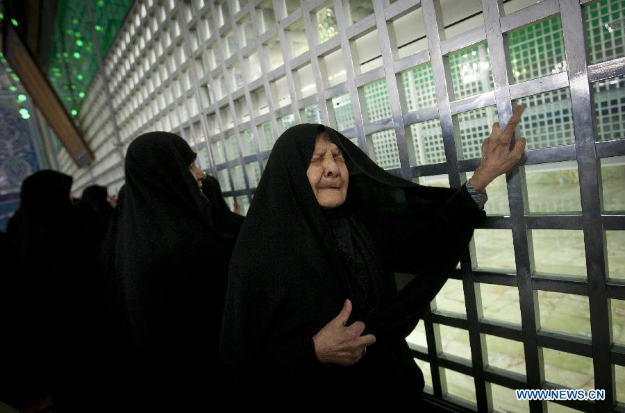 Iranian women are seen in Iran's late Islamic revolution leader Ayatollah Khomeini' shrine, in Tehran, Iran, Jan. 31, 2013, during a ceremony marking the time when Khomeini returned to Tehran, on Jan. 31, 1979 from 14 years of exile in Paris. Iran started Thursday to celebrate the 34th anniversary of the 1979 Islamic revolution. (Xinhua/Ahmad Halabisaz)