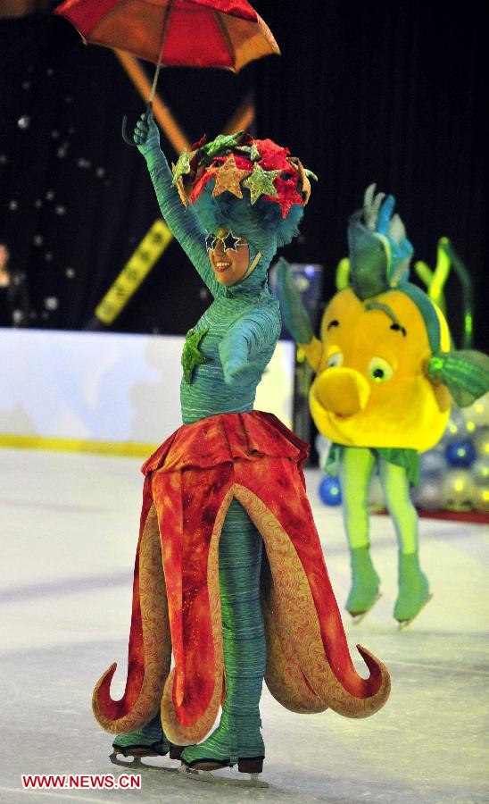 A dancer performs Disney's dance drama "Princess and Hero" on ice in Taipei, southeast China's Taiwan, Jan. 31, 2013. The dance drama will show in Taichung, Taipei and Kaohsiung in February.(Xinhua/Wu Ching-teng)