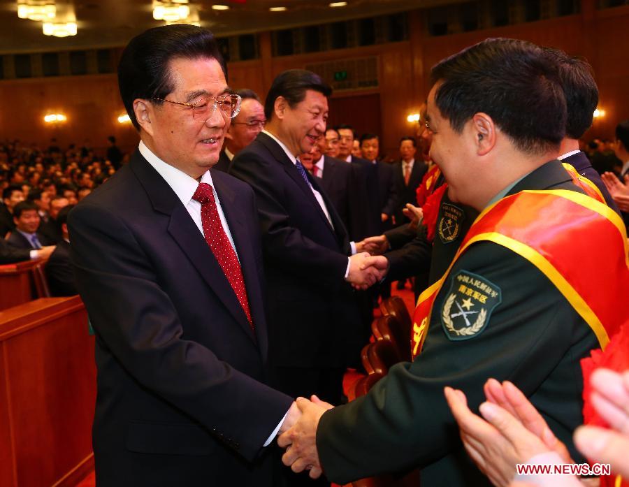 Chinese leaders Hu Jintao, Xi Jinping, Wu Bangguo,Wen Jiabao, Jia Qinglin, Li Keqiang, Zhang Dejiang, Yu Zhengsheng, Liu Yunshan, Wang Qishan and Zhang Gaoli attend an art performance, extending Spring Festival greetings to the military and the people in Beijing, capital of China, Feb.1, 2013. (Xinhua/Zha Chunming)