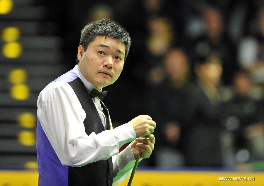 Ding Junhui of China reacts during the round 4 game against Mark Selby of England at the German Masters in Berlin, Germany, February 1, 2013. Ding lost 3-5. (Xinhua/Ma Ning)