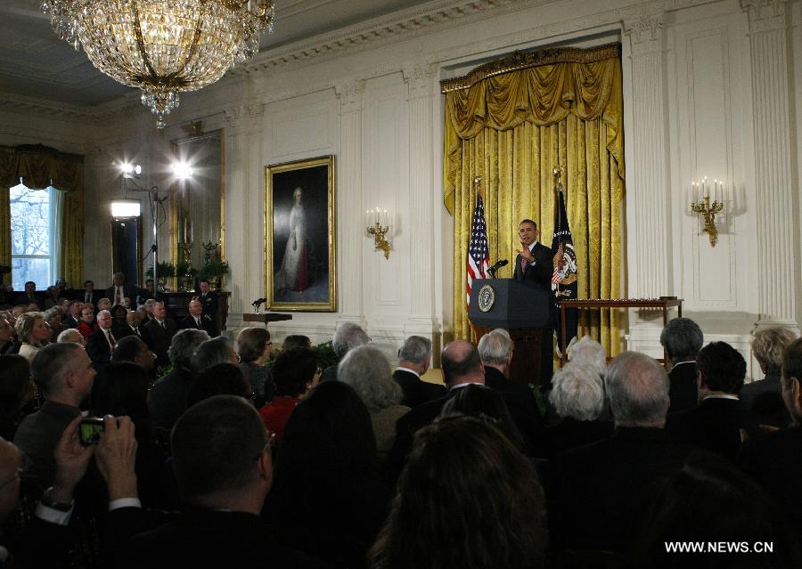 U.S. President Barack Obama speaks during a ceremony to award National Medal of Science and National Medal of Technology and Innovationat at the White House in Washington D.C., the United States, on Feb. 1, 2013. (Xinhua/Fang Zhe)