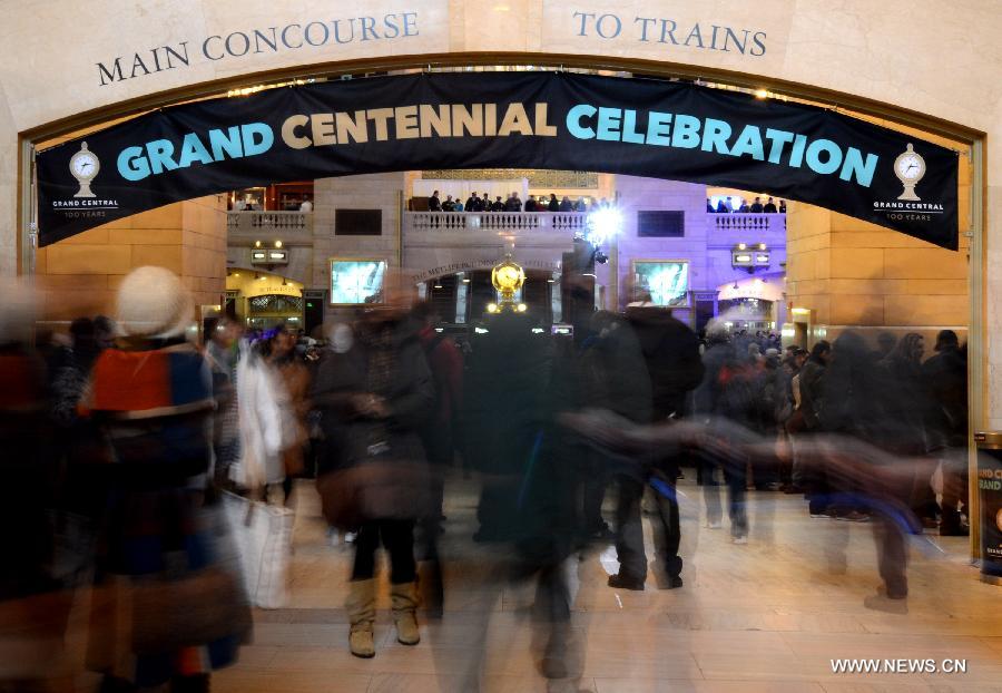 Commuters walk inside Grand Central Terminal in New York on Feb. 1, 2013. Grand Central Terminal, the New York city's landmark, turned 100 years old on Friday. (Xinhua/Wang Lei)