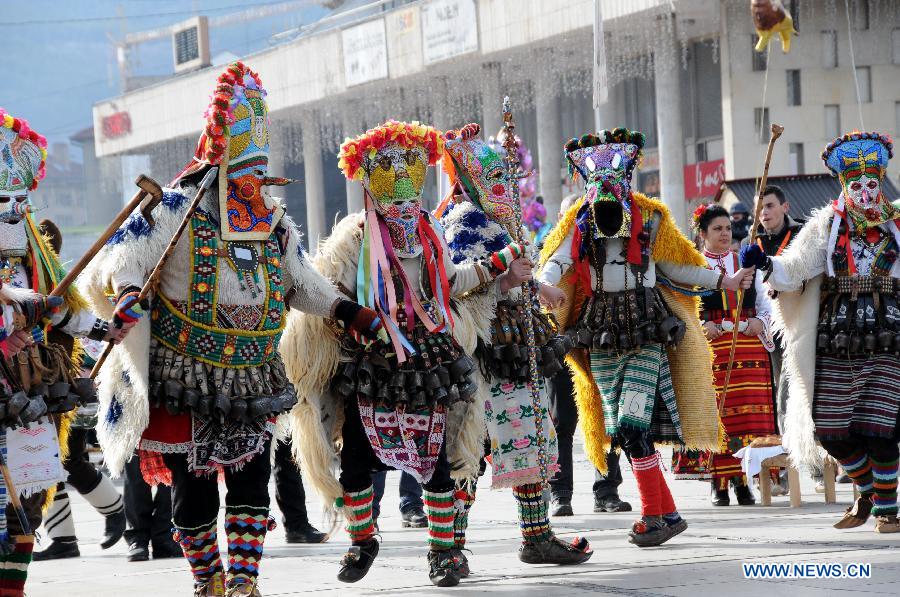 Performers parade with masks during a celebration of the International Mask Festival in Pelnik in Bulgaria, Feb. 2, 2013. All together 6,092 performers from 11 countries and regions participated in this year's festival.(Xinhua/Chen Hang) 