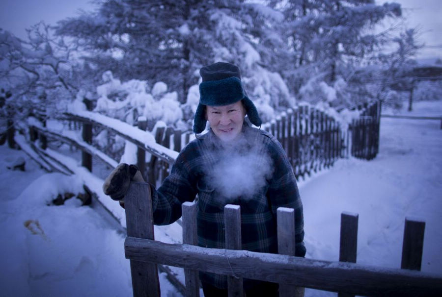 A villager dresses for a quick dash to the outdoor toilet at his home in Oymyakon. (Globaltimes.cn)