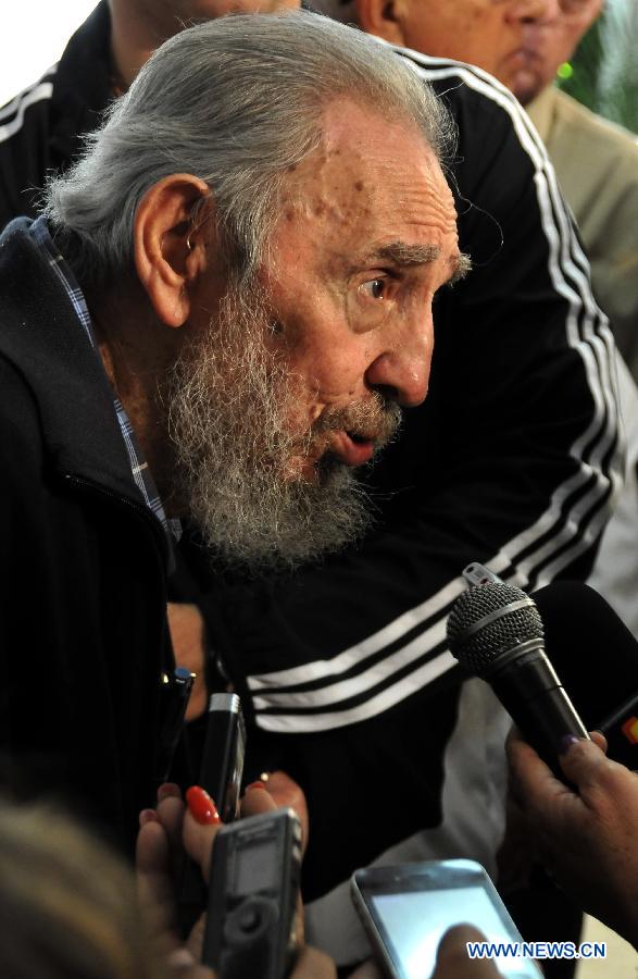 Cuban former leader Fidel Castro receives interview after casting his vote during the second phase of the general elections from 2012 to 2013, at the Revolution Square in Havana, capital of Cuba, on Feb. 3, 2013. (Xinhua/Joaquin Hernandez)