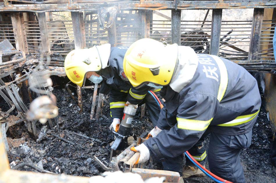 Firefighters dismantle the wreck of a burnt bus in in Ning county, northwestern China’s Gansu province, Feb. 2. On Friday night, a bus fell into a ravine and caught fire, killing 18 people. Road accidents have claimed about 60 lives from Jan. 31 to Feb. 1. The fatal accidents shocked the whole country as hundreds of millions of Chinese journeyed home amid the Spring Festival travel rush that started on Jan. 26. (Photo/Xinhua)