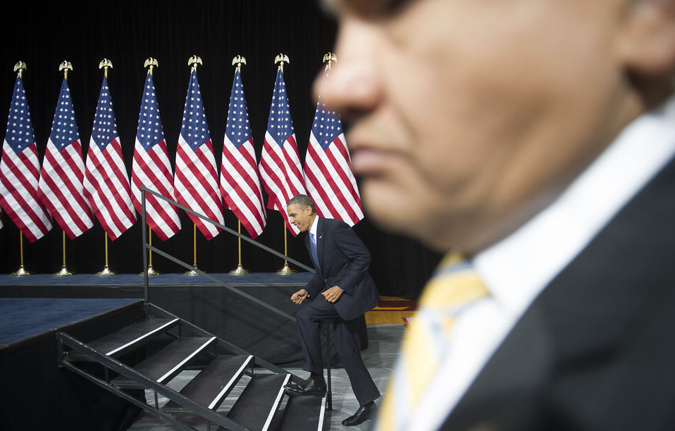 U.S. President Barack Obama moves towards the lectern to make a speech in Las Vegas, Nevada, United States. In a speech Tuesday in Nevada, Obama is expected to praise the blueprint offered Monday by a bipartisan group of senators, while re-affirming the plan he put up in 2011 and calling for continuing negotiations in both the Senate and the House. (Xinhua News Agency/AFP)