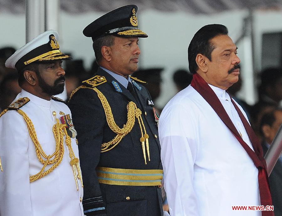 Sri Lankan President Mahinda Rajapakse (1st R) attends the country's 65th Independence Day celebration in Trincomalee, Sri Lanka, Feb. 4, 2013. (Xinhua/Sameera)